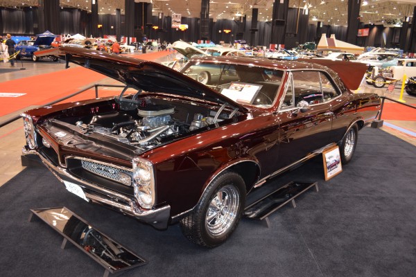 maroon 1967 pontiaC GTO SHOW CAR WITH CRAGAr s/s wheels