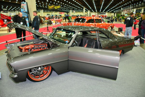 lowered custom chevy 2 nova on display at indoor car show