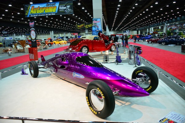 custom belly tank salt flats racer on display at indoor car show