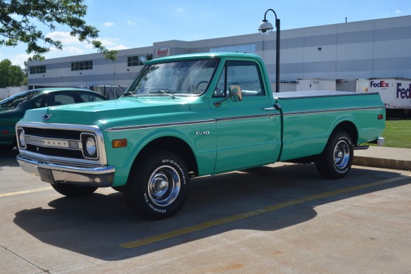 aqua green 1969 chevy c10 pickup truck, driver side