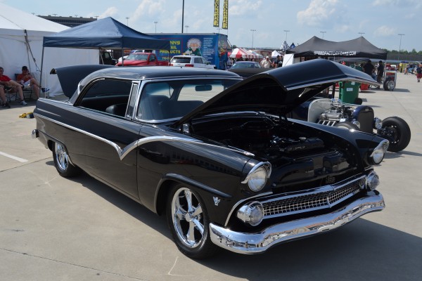 vintage 1950s era ford fairlane with custom wheels