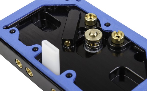 billet aluminum metering block on a performance carburetor