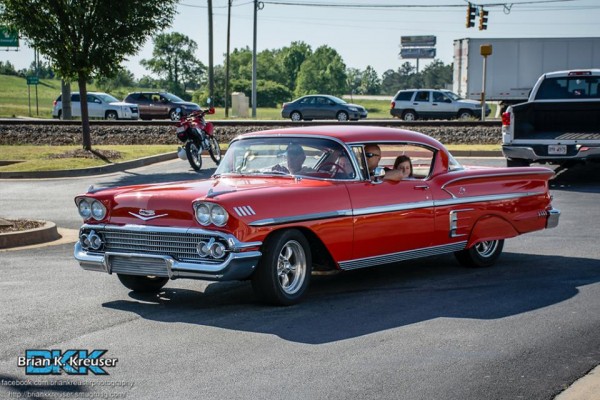 red 1958 chevy bel air two door hardtop coupe