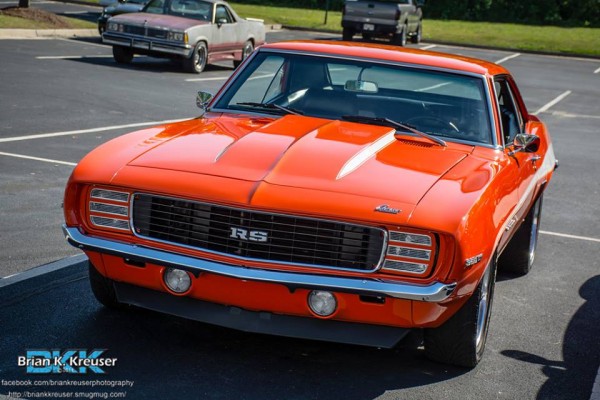 orange first gen chevy camaro RS coupe