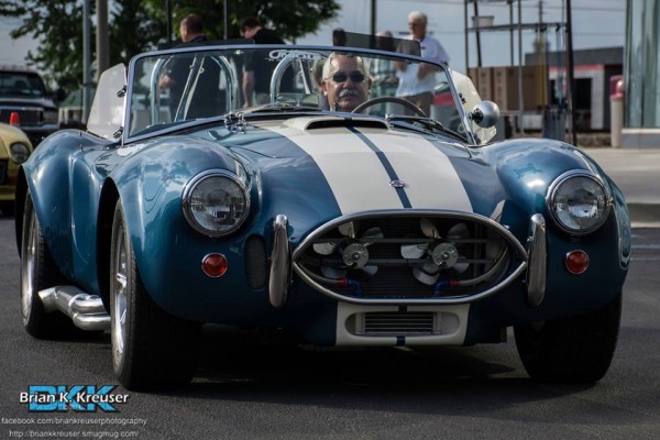 man driving a shelby cobra kit car