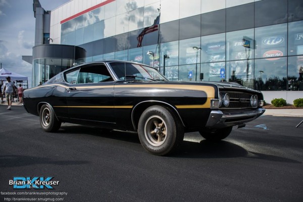 ford torino fastback coupe with custom wheels