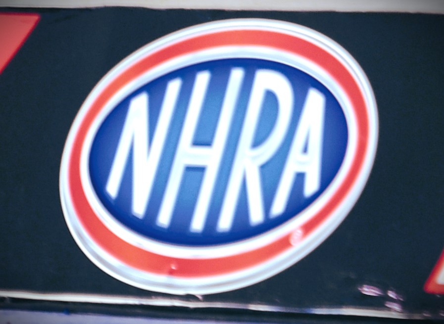 nhra logo on drag race retaining wall