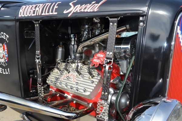 ford flathead v8 engine with edelbrock heads in a vintage hot rod