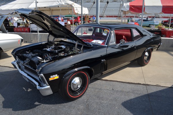 Black Chevy Nova SS 396 with dog dish hubcaps