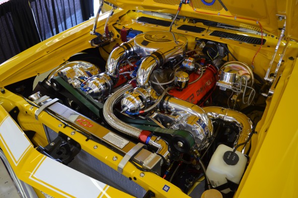 big block chevy with twin centrifugal superchargers in a classic camaro