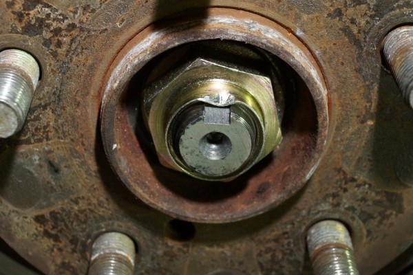 dimple on an axle retention nut