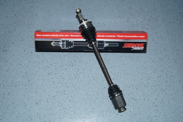 new subaru wrx cv axle on shop floor