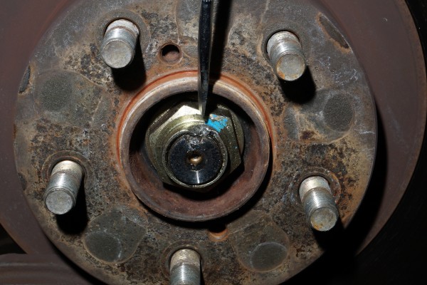 removing axle retantion nut from a subaru wrx axle