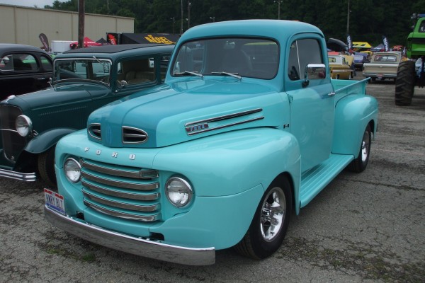 blue ford vintage f-1 pickup truck