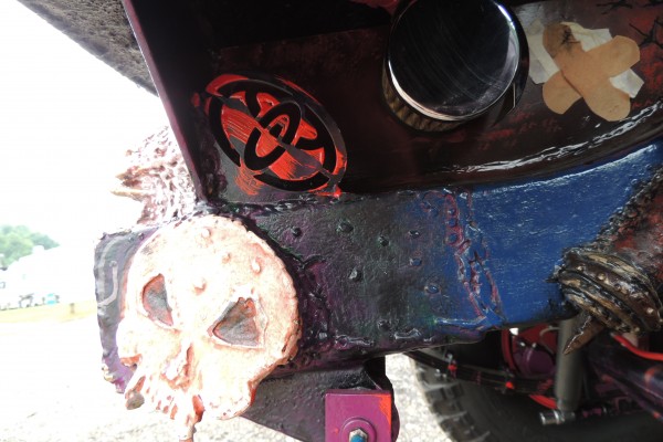 skull painted on the frame of a hot rod truck