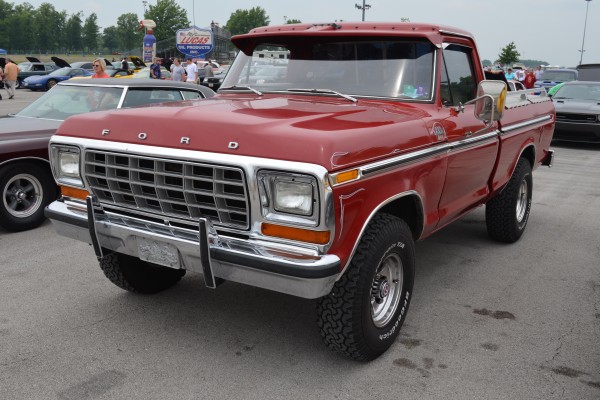 1970s era ford f-series red pickup truck