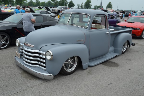 lowered chevy 3100 pickup truck in primer gray