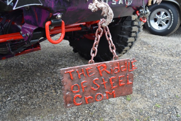 rat rod sign hanging from chain