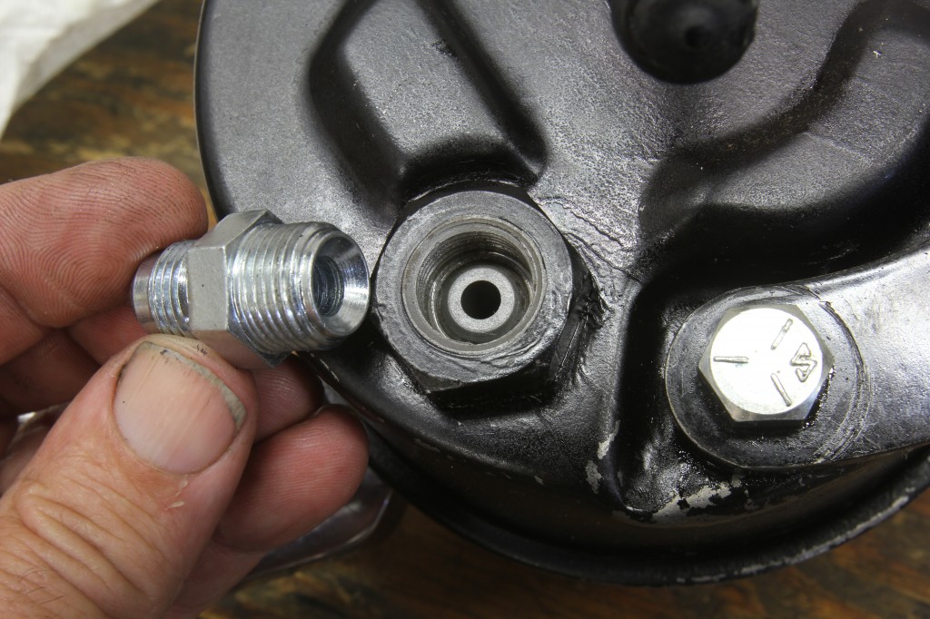 removing a fitting from a saginaw style power steering pump