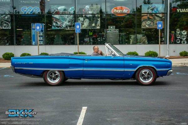 man in a convertible dodge coronet 440