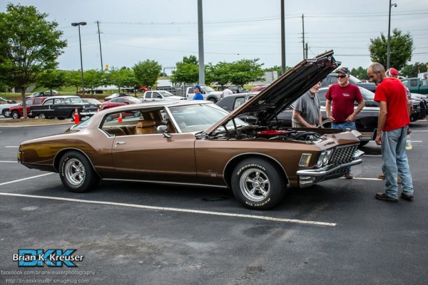 buick riviera boat tail coupe at a car show