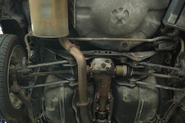 stock exhaust for a subaru wrx on a lift