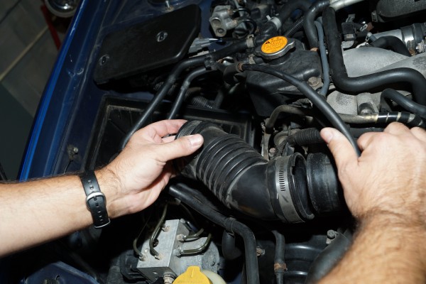 removing flexible air intake tubing from a Subaru wrx engine bay