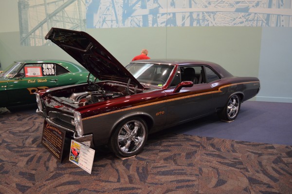 Pro Street Pontaic GTO Coupe at an indoor car show