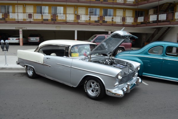 silver and white 1955 chevy coupe with custom cragar s/s wheels