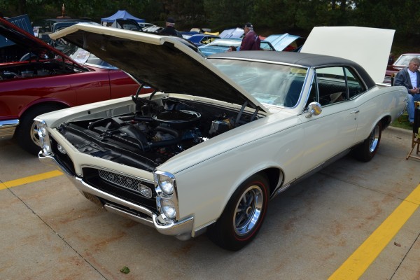 vintage white Pontiac 1966 GTO