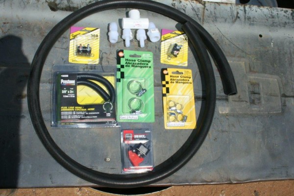 air hoses and clamps on a work table