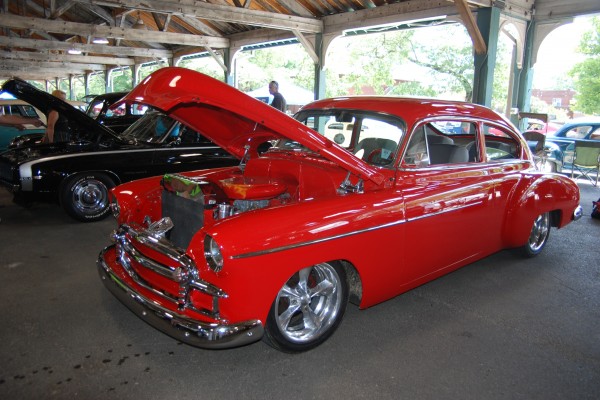 red customized chevy postwar coupe