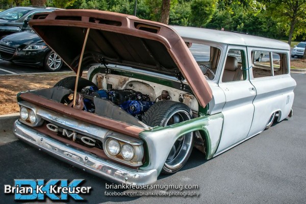 vintage slammed and bagged GMC suburban SUV