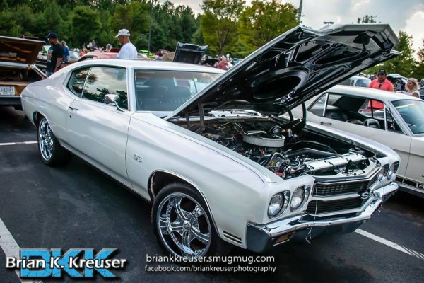 White chevy chevelle ss at a summit racing car show