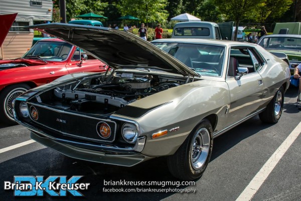 silver amc javelin amx at a car show