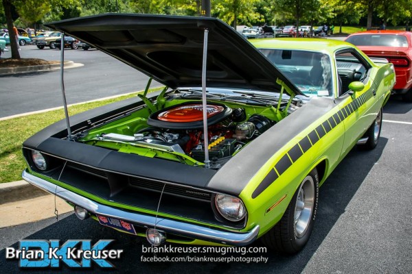 plymouth AAR cuda at a car show