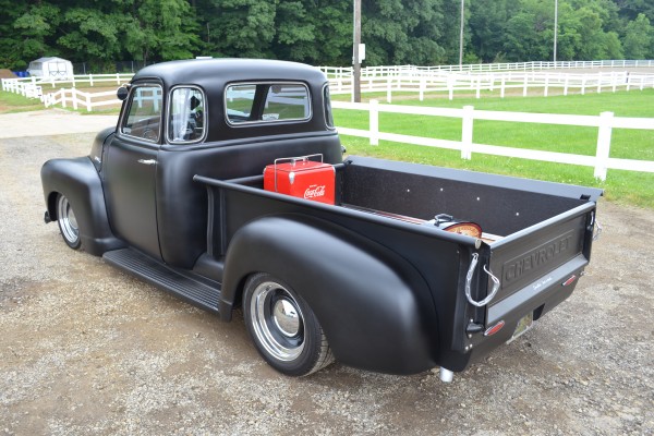 rear quarter view of a hot rod 1949 chevy 3100 truck
