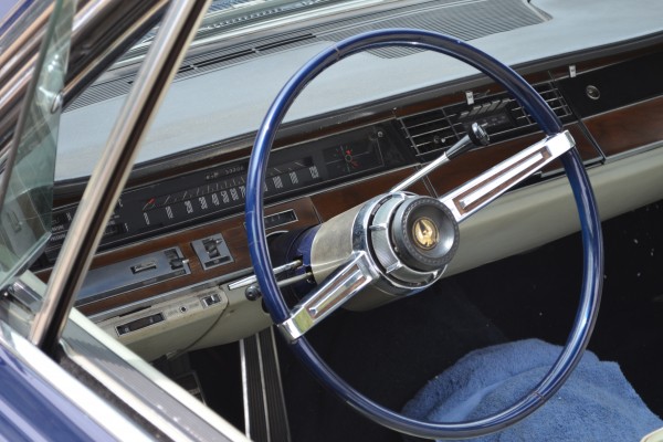 interior and dash gauge cluster of a 1967 Chrysler Imperial