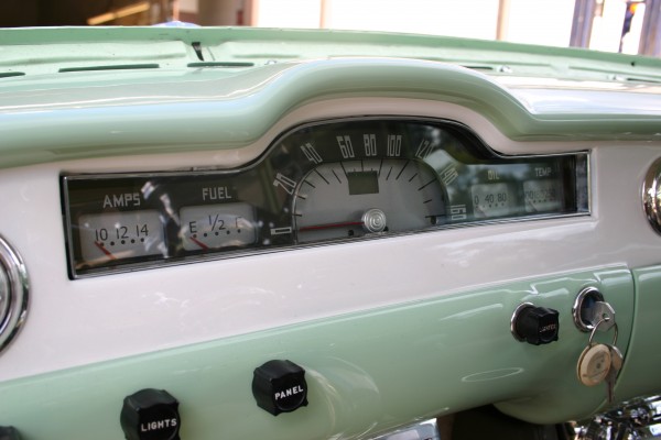Redline Gauge Works vintage gauge panel in a 1953 Plymouth suburban