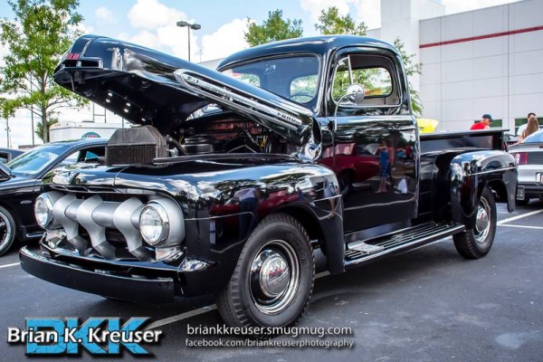 vintage ford f-1 truck at a car show