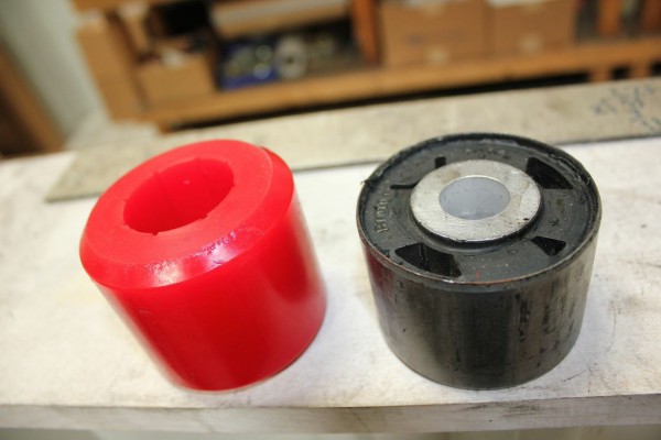 polyurethane bushing side by side comparison with stock rubber bushing