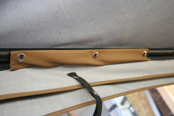 snaps on a jeep cj soft top head rail