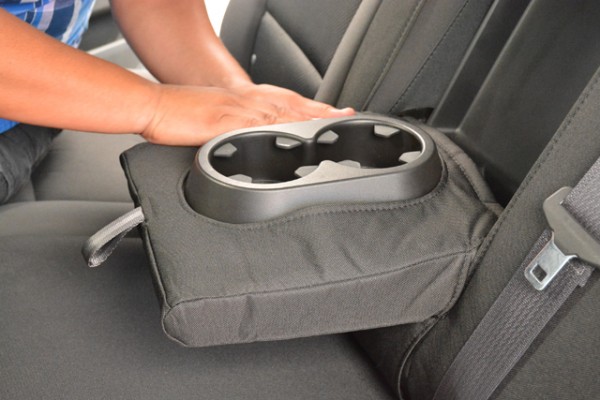 cover going onto a center armrest in a pickup truck