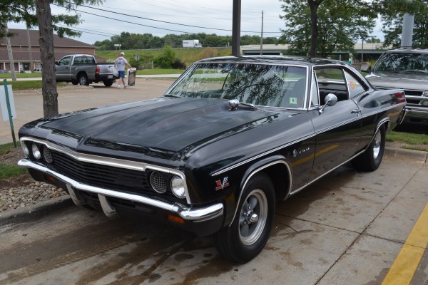 black 1966 chevy impala coupe street rod at summit racing