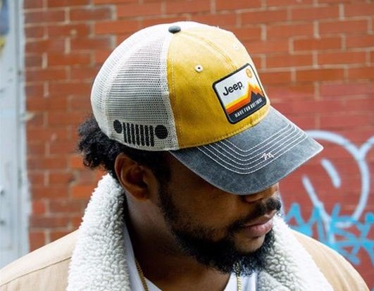 man wearing a jeep hat