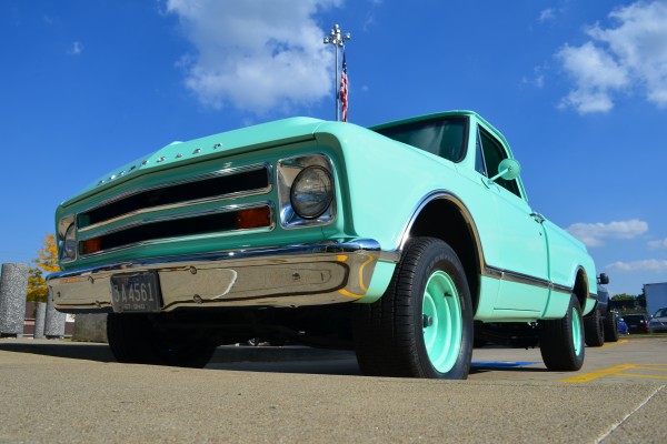 Seafoam green 1967 Chevy C10 Custom Pickup truck, low quarter view