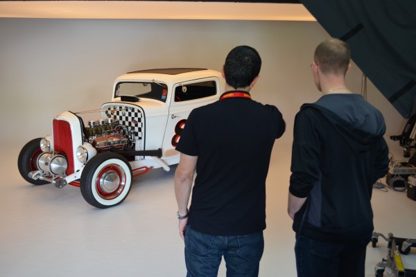 men determine shot for a christmas themed hot rod photo shoot