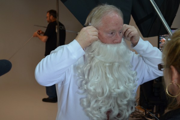 man dressing up as santa