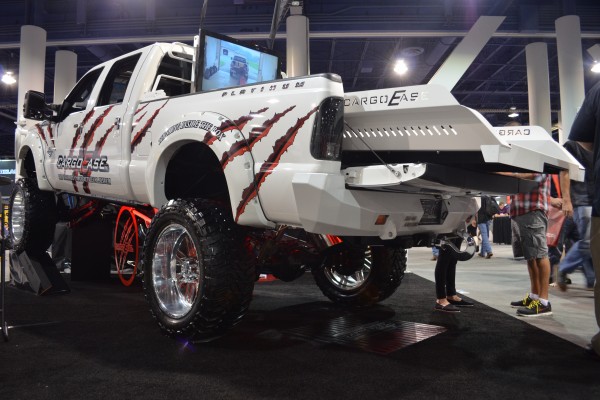 cargo ease booth display at 2014 SEMA automotive trade show