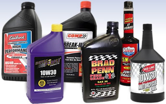 assortment of bottles of engine oil additives